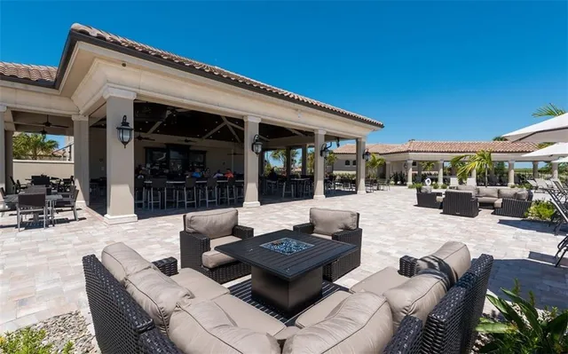 an aerial view of multiple houses with yard