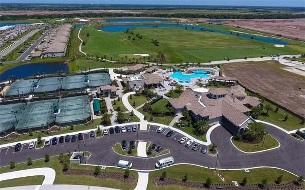 a view of a swimming pool with a patio