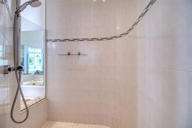 a view of swimming pool from a living room