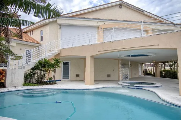 a house with trees in the background