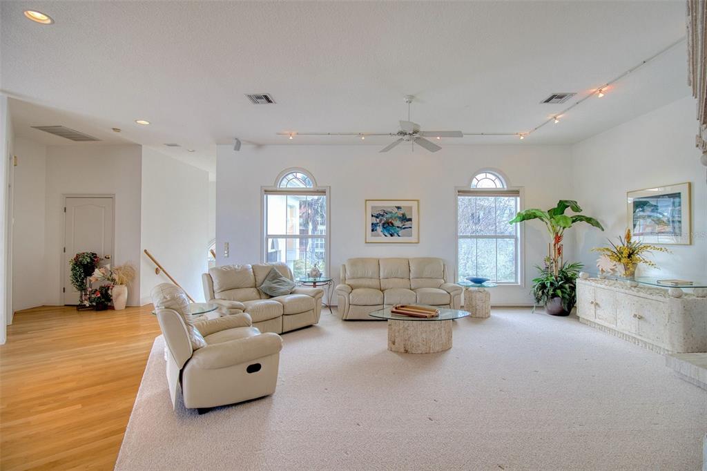 131 13th Street East Tierra Verde, FL 33715 - Photo 6 of 54 a living room with furniture and a large window