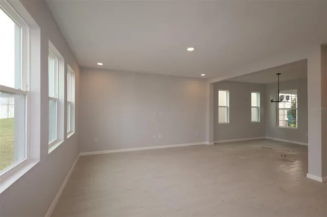 an empty room with windows