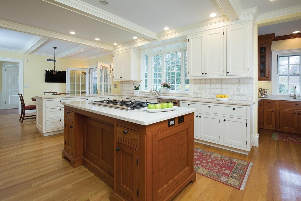 65 Suffolk Road Newton, MA 02467 - Photo 6 of 17 a kitchen with a stove sink and cabinets