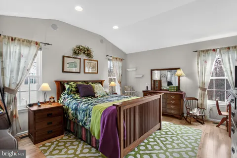 a bed room with a bed and furniture