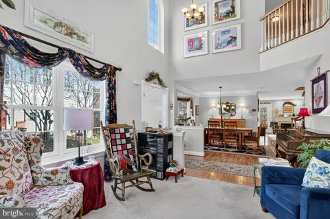 a view of a livingroom with furniture and toys