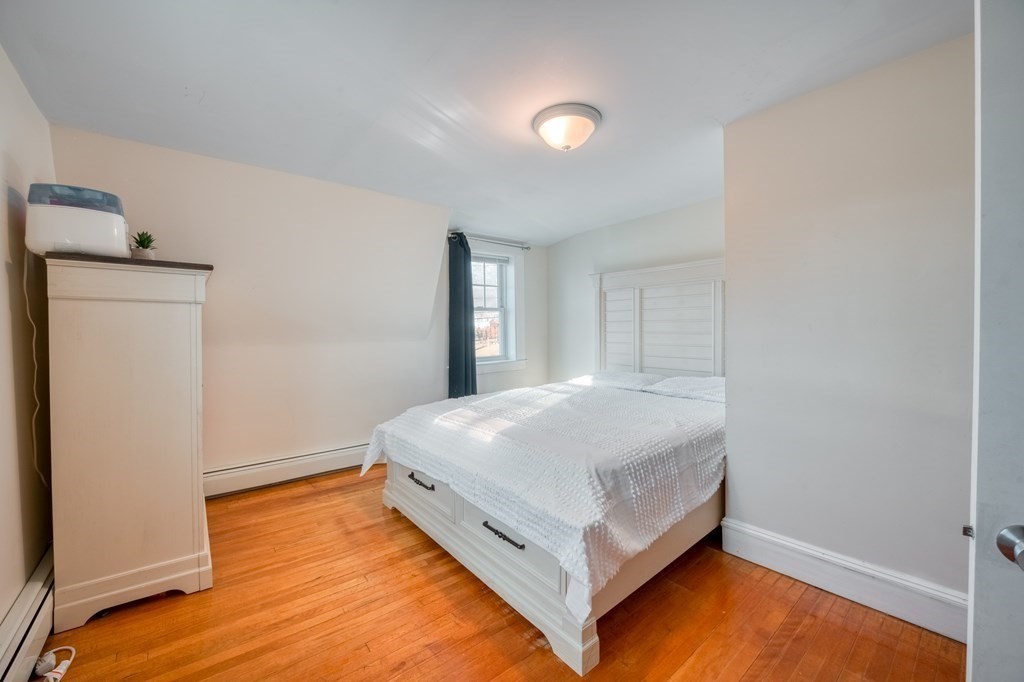 87 Conant Street Danvers, MA 01923 - Photo 14 of 31 a room with a bed and a window