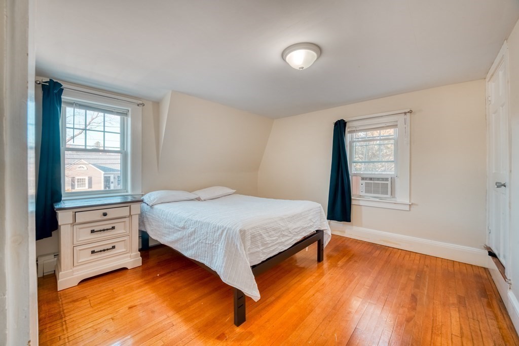 87 Conant Street Danvers, MA 01923 - Photo 16 of 31 a bedroom with a bed and window