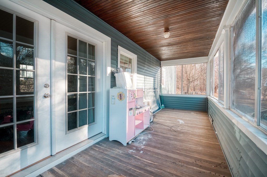 87 Conant Street Danvers, MA 01923 - Photo 22 of 31 a view of entrance gate with wooden floor and windows