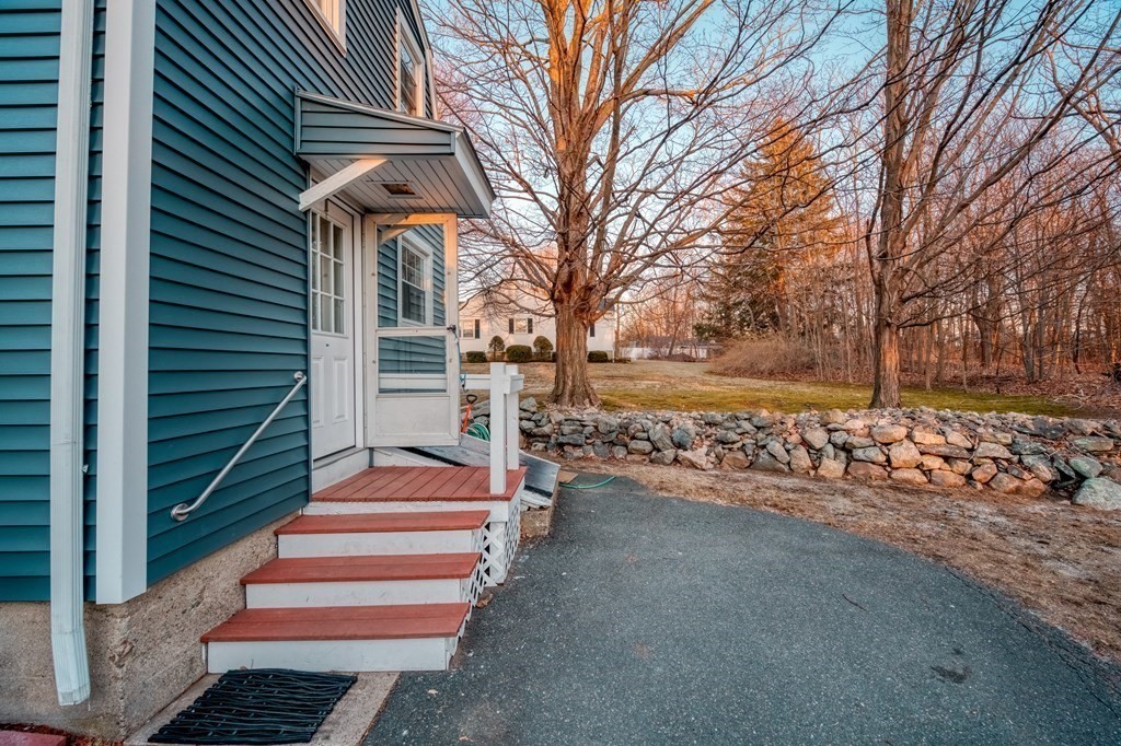 87 Conant Street Danvers, MA 01923 - Photo 26 of 31 a view of a pathway with a house