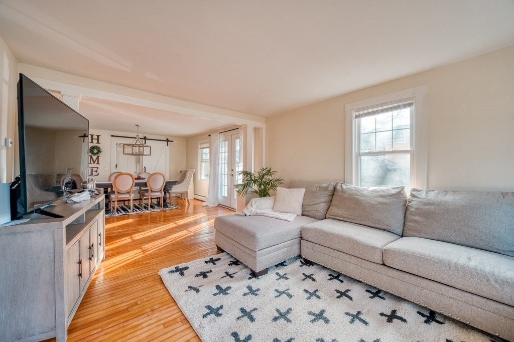 87 Conant Street Danvers, MA 01923 - Photo 8 of 31 a living room with furniture and a couch