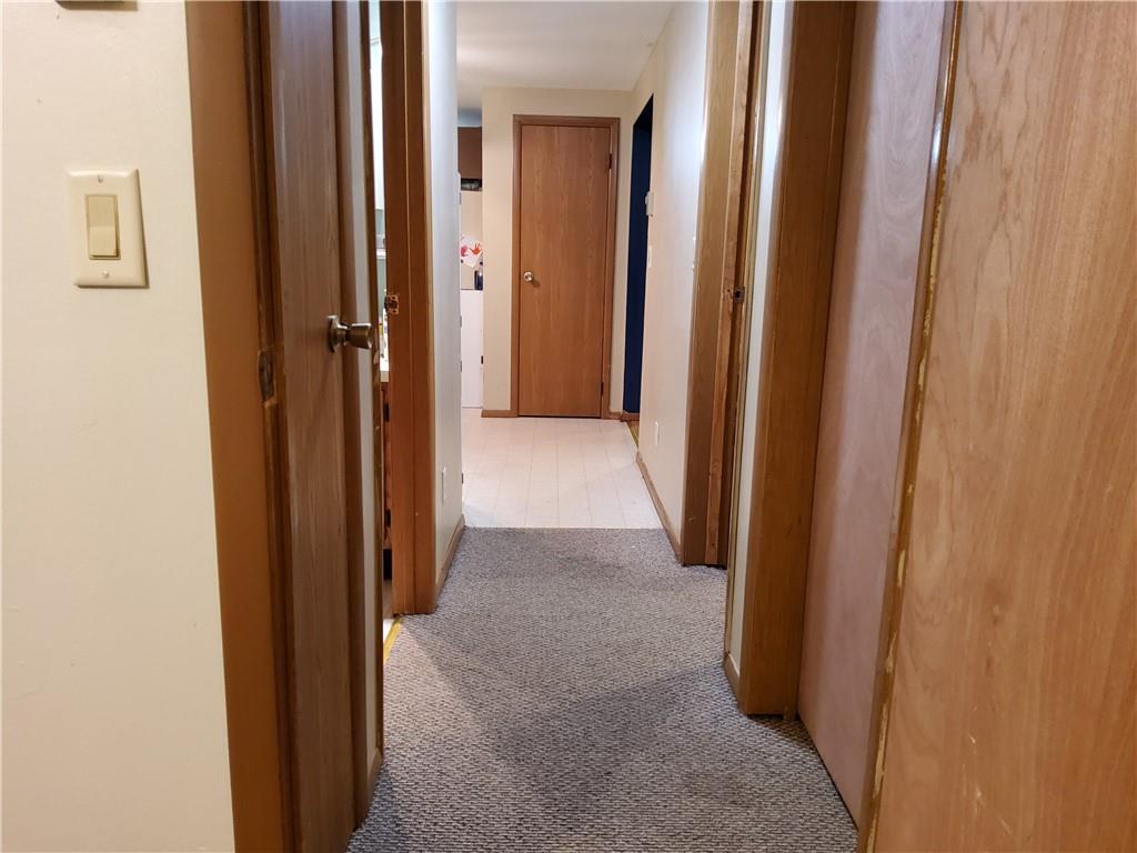 105 Fredonia Road Mercer, PA 16137 - Photo 8 of 11 a view of a hallway with a wooden door