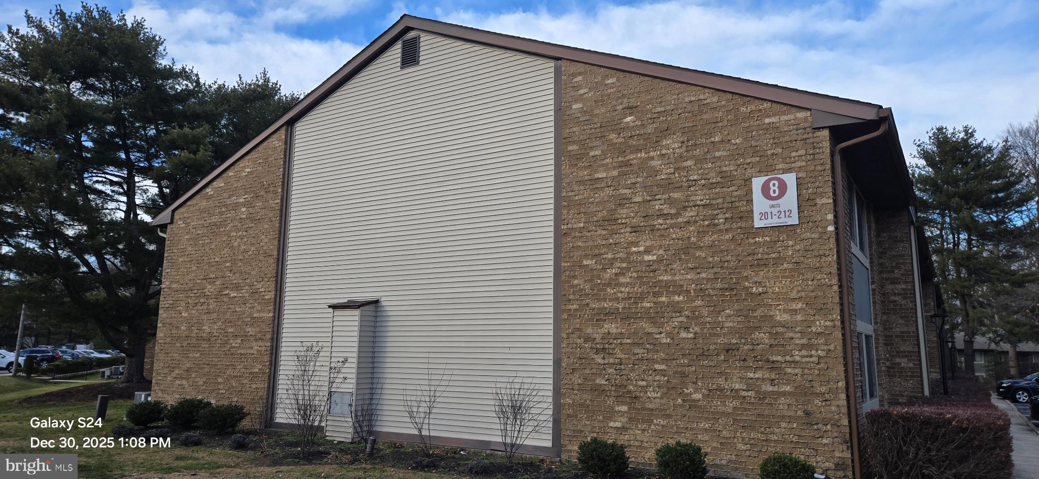 115 East Kings Highway, Unit 211 Maple Shade, NJ 08052 - Photo 5 of 10 a view of a house with a yard