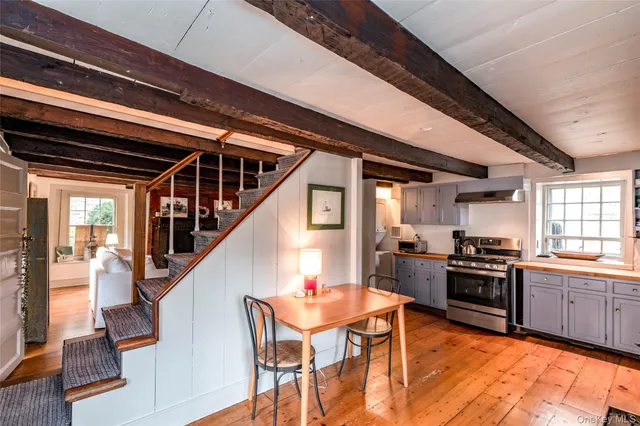 a kitchen with stainless steel appliances granite countertop a stove and a refrigerator