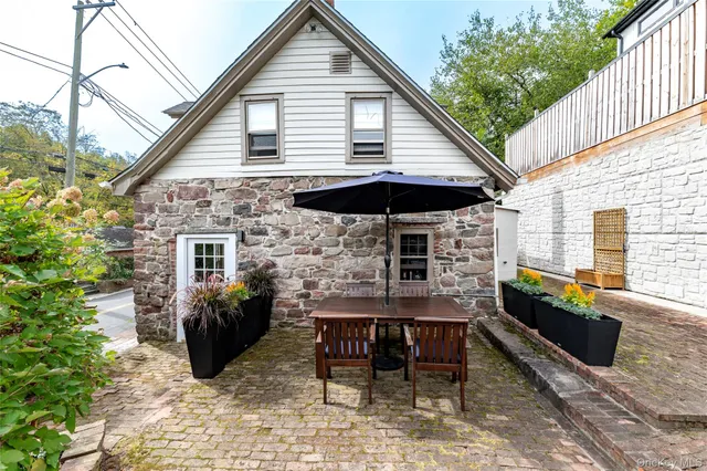 a backyard of a house with seating space