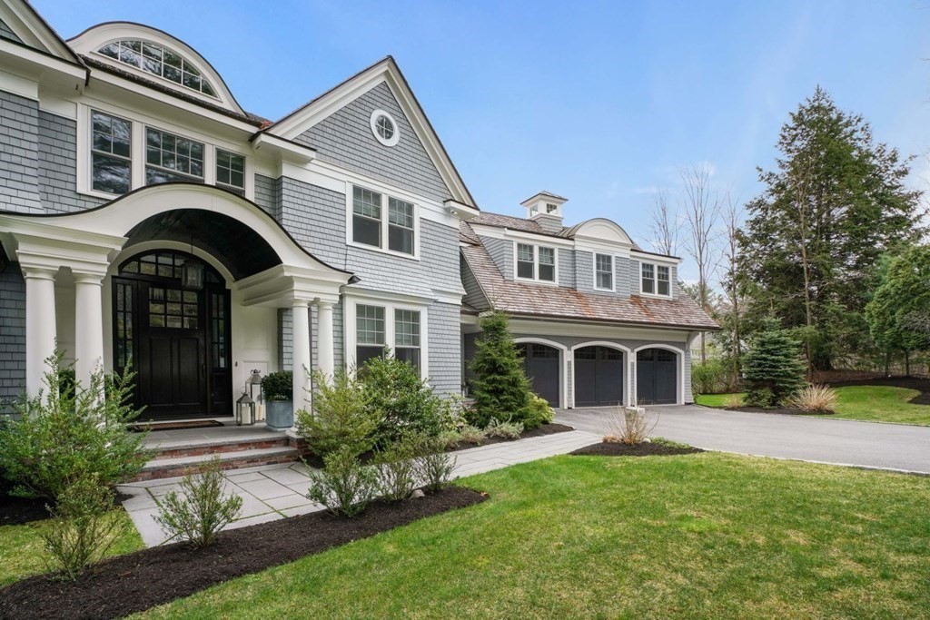 64 Cartwright Road Needham, MA 02492 - Photo 2 of 40 a front view of a house with garden