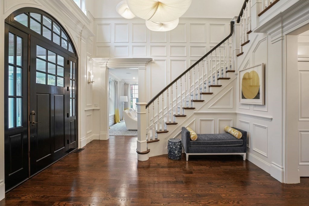 64 Cartwright Road Needham, MA 02492 - Photo 3 of 40 a view of entryway and hall with wooden floor