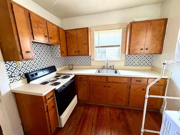 a view of a backyard with a garden