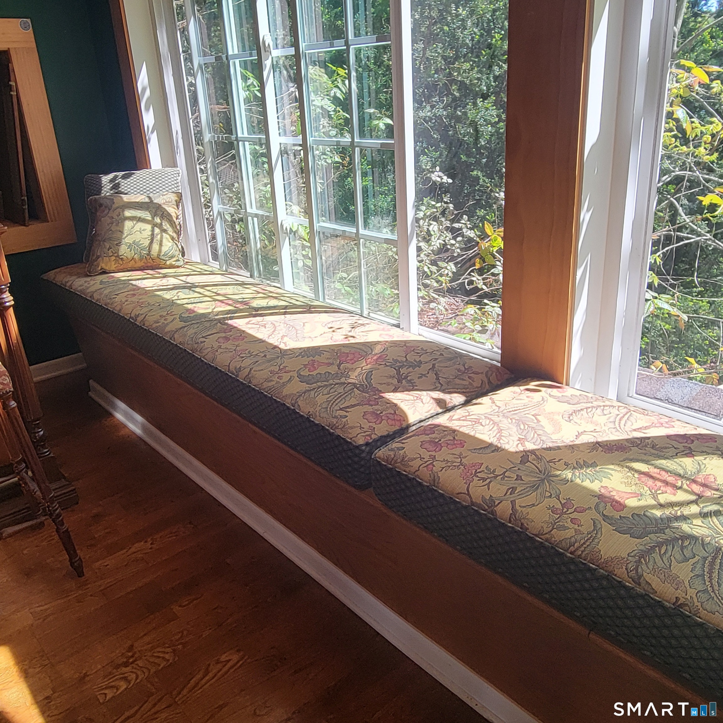 22 Ridgewood Road East Haddam, CT 06415 - Photo 13 of 28 The full length bench under the wall of glass for seating and lots of storage