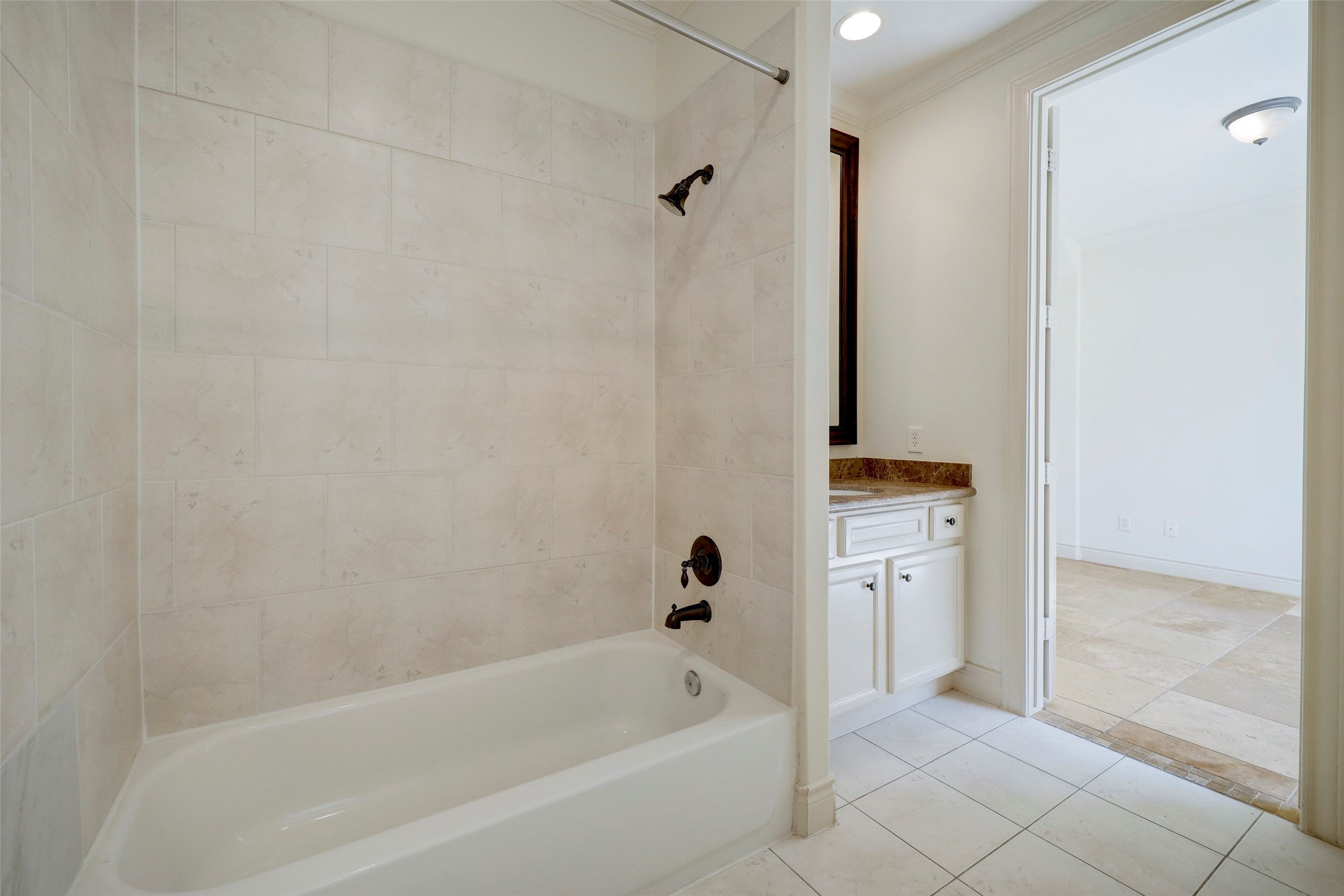 1436 Wichita Street Houston, TX 77004 - Photo 14 of 47 a bathroom with a bathtub and a shower