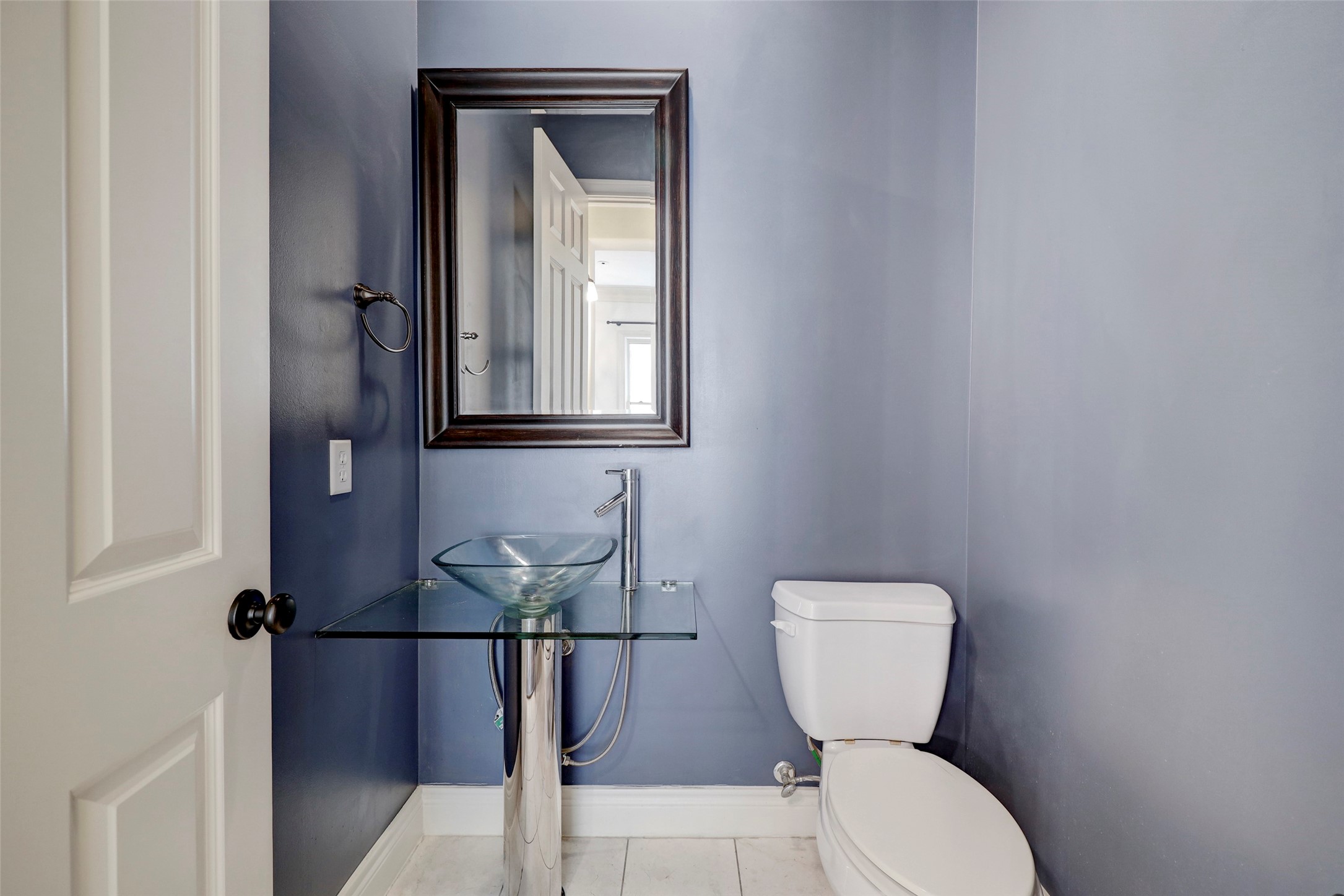 1436 Wichita Street Houston, TX 77004 - Photo 34 of 47 a bathroom with a toilet sink and mirror