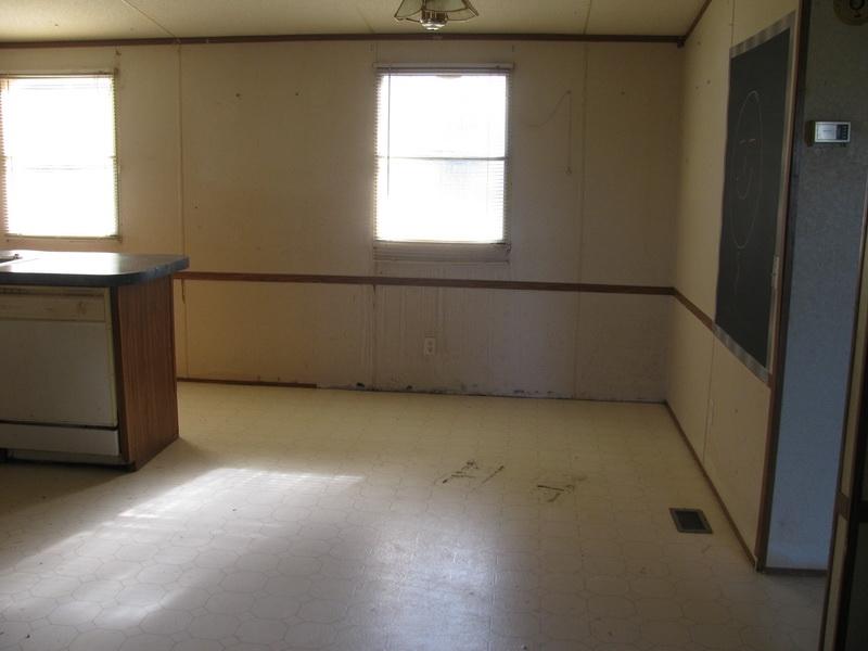 5310 Brush Creek Road Riner, VA 24149 - Photo 4 of 14 a view of a room that has a window in it