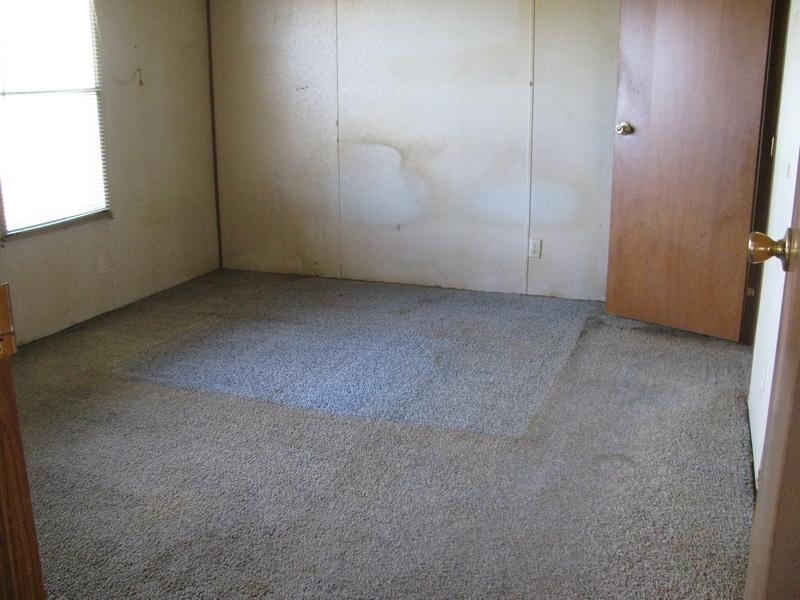 5310 Brush Creek Road Riner, VA 24149 - Photo 5 of 14 an empty room with windows