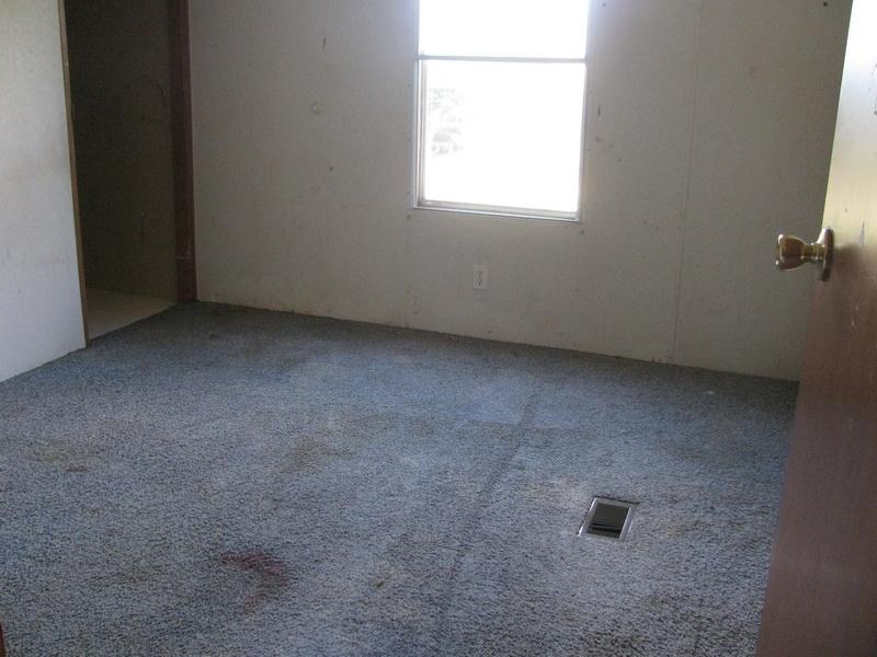 5310 Brush Creek Road Riner, VA 24149 - Photo 7 of 14 an empty room with a window