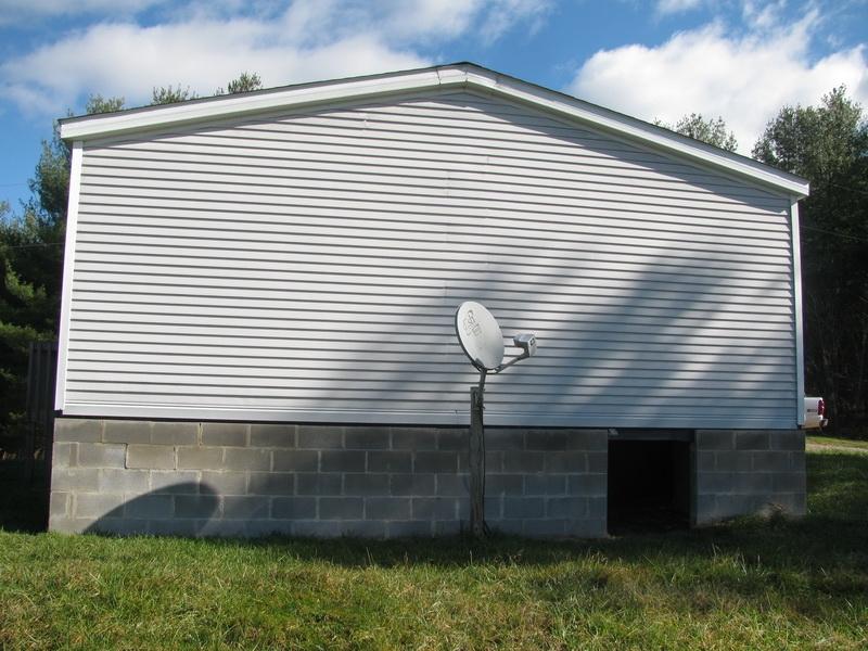 5310 Brush Creek Road Riner, VA 24149 - Photo 10 of 14 a front view of a house with a yard