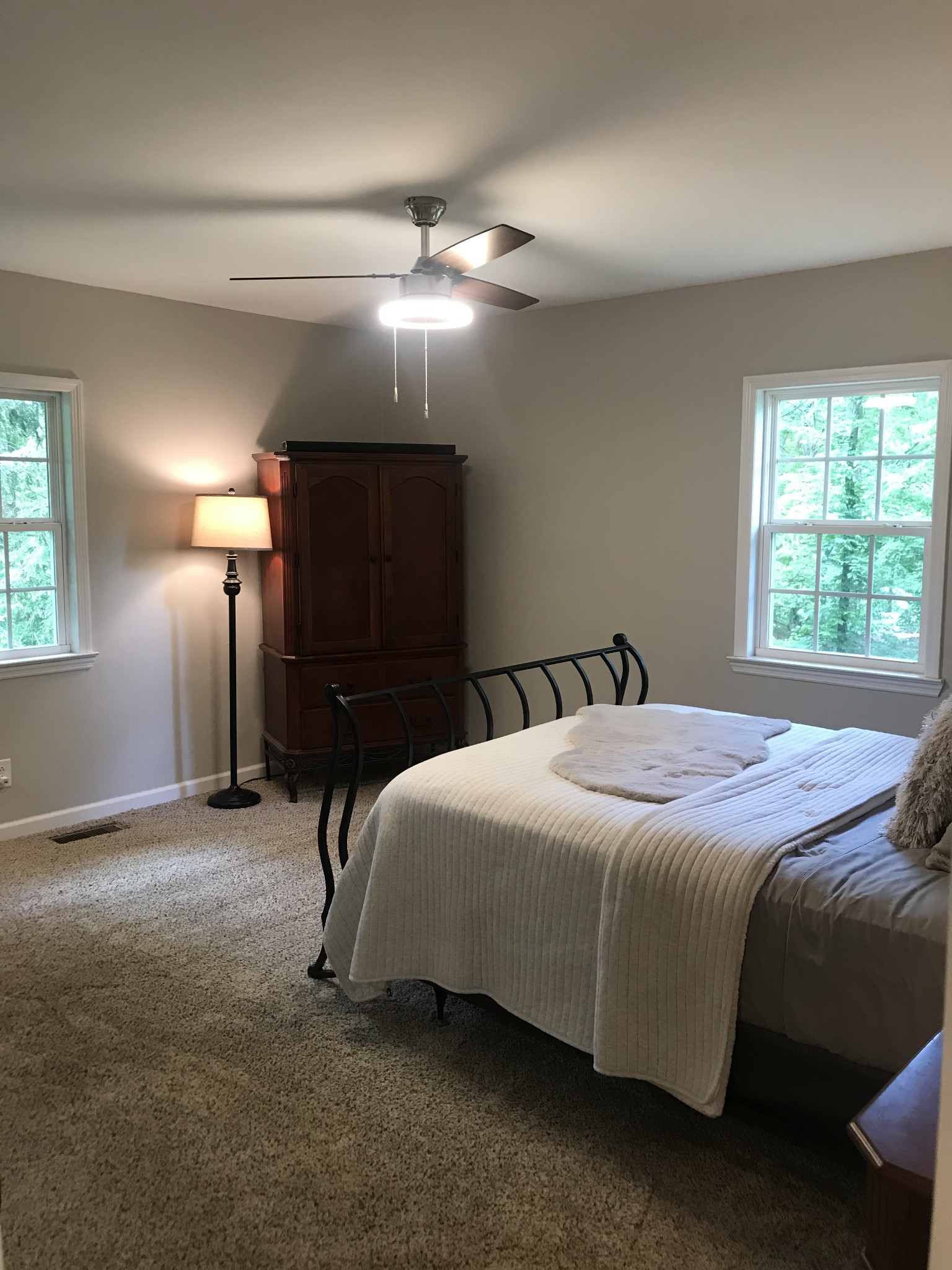 5534 Hickory Ridge Road Lebanon, TN 37090 - Photo 34 of 50 a bedroom with a bed and a chandelier