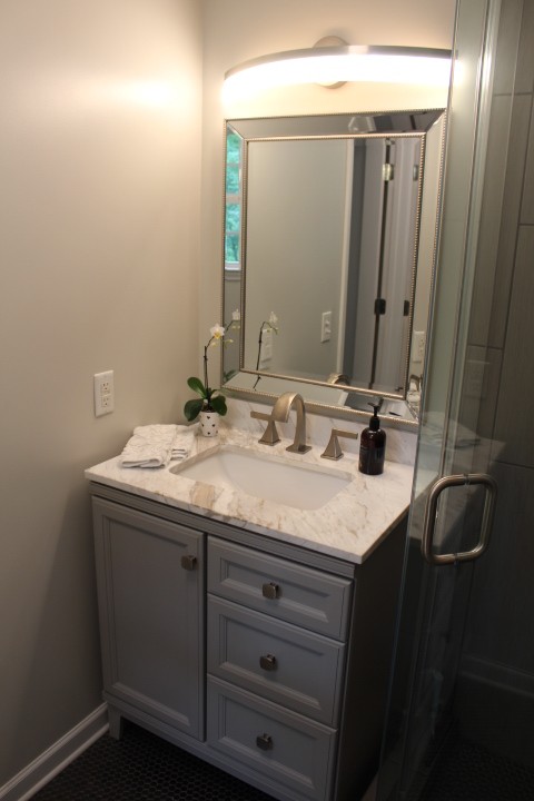 5534 Hickory Ridge Road Lebanon, TN 37090 - Photo 36 of 50 a bathroom with a granite countertop sink and a mirror