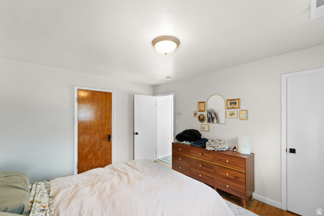 257 200 South Provo, UT 84606 - Photo 27 of 40 Bedroom featuring wood finished floors and baseboards