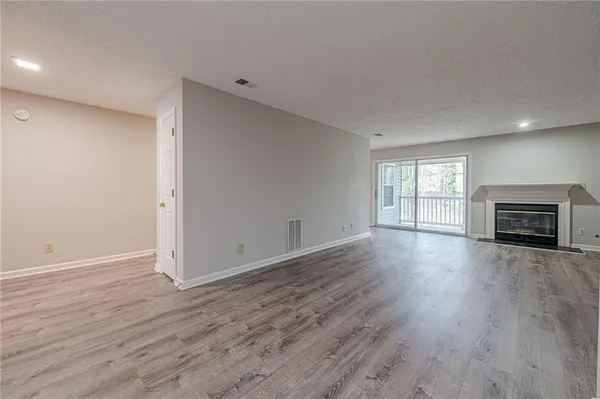 a kitchen with stainless steel appliances granite countertop a stove sink and cabinets