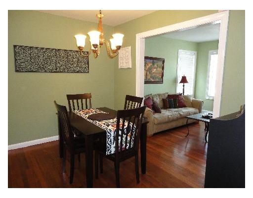4209 Harry Street Corpus Christi, TX 78411 - Photo 3 of 10 a view of a dining room with furniture and wooden floor