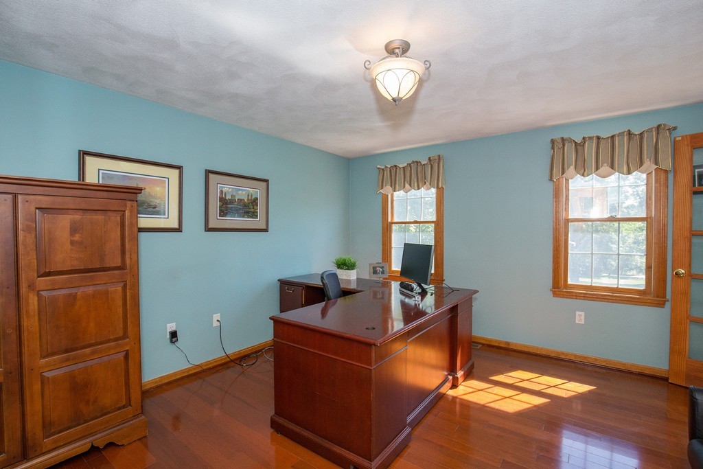 19 Gov Doherty Road Billerica, MA 01821 - Photo 12 of 28 a living room with furniture and a window