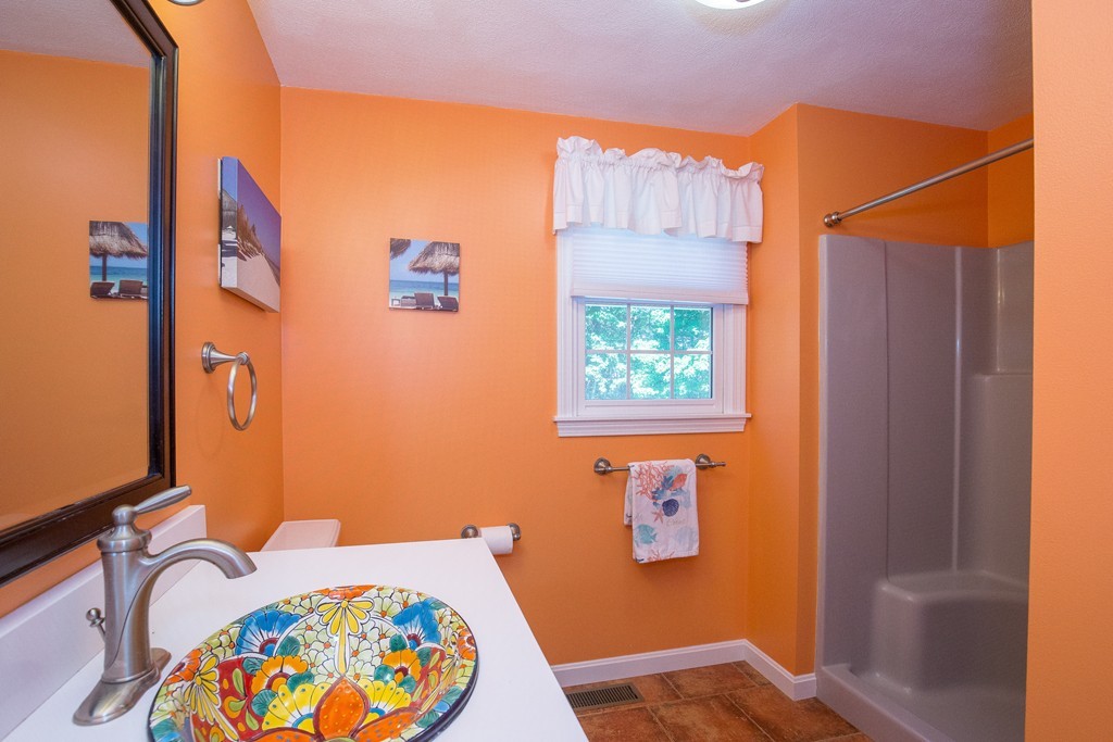 19 Gov Doherty Road Billerica, MA 01821 - Photo 14 of 28 a bedroom with a bed and a window