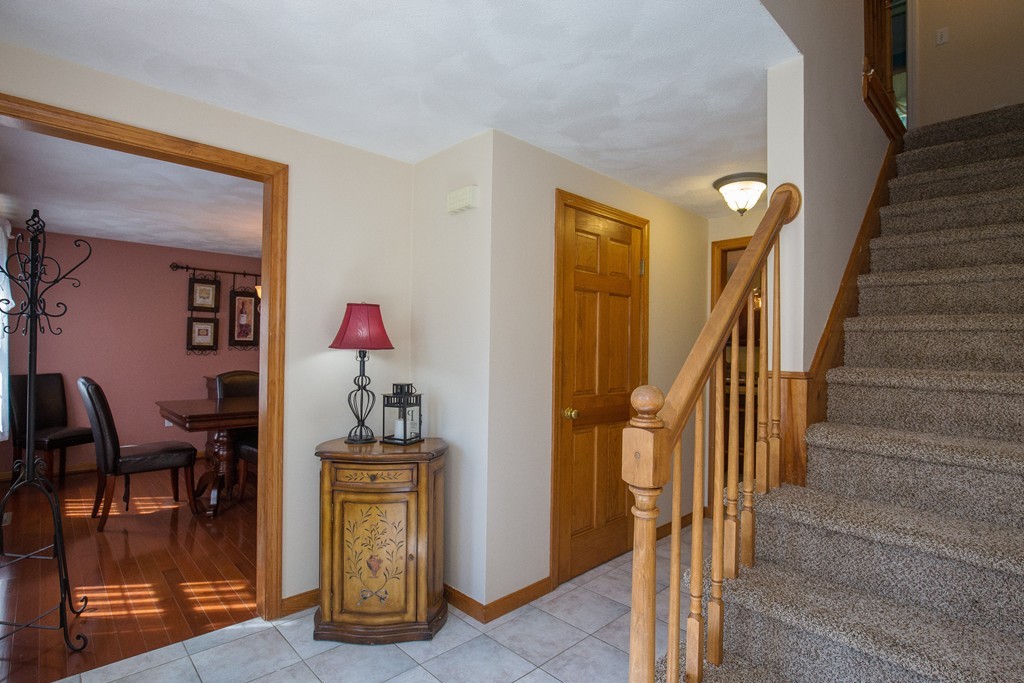 19 Gov Doherty Road Billerica, MA 01821 - Photo 15 of 28 a view of hallway with livingroom and furniture
