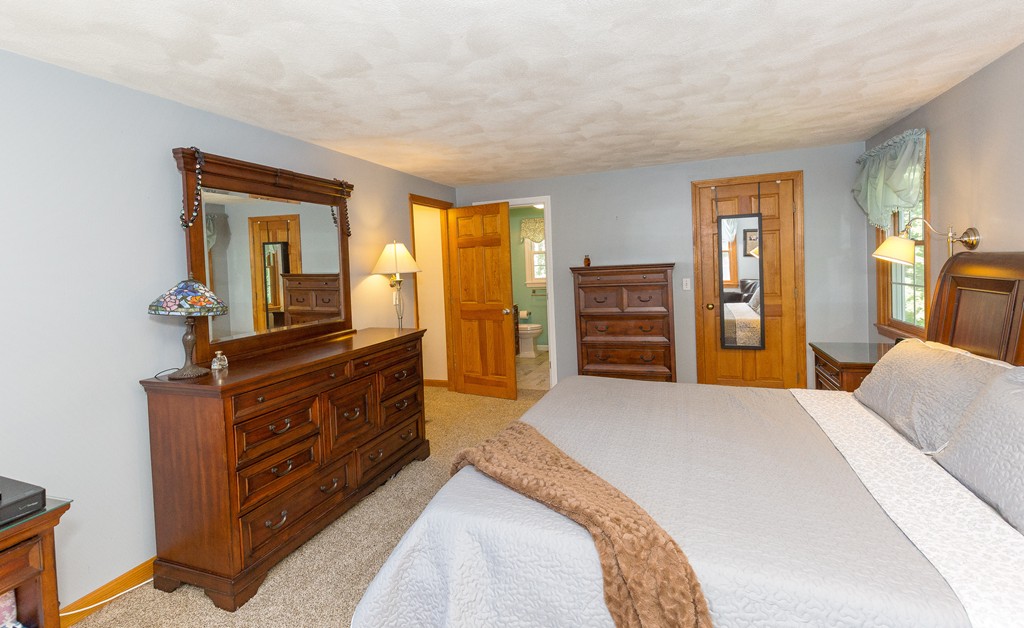 19 Gov Doherty Road Billerica, MA 01821 - Photo 17 of 28 a bedroom with a bed and a dresser