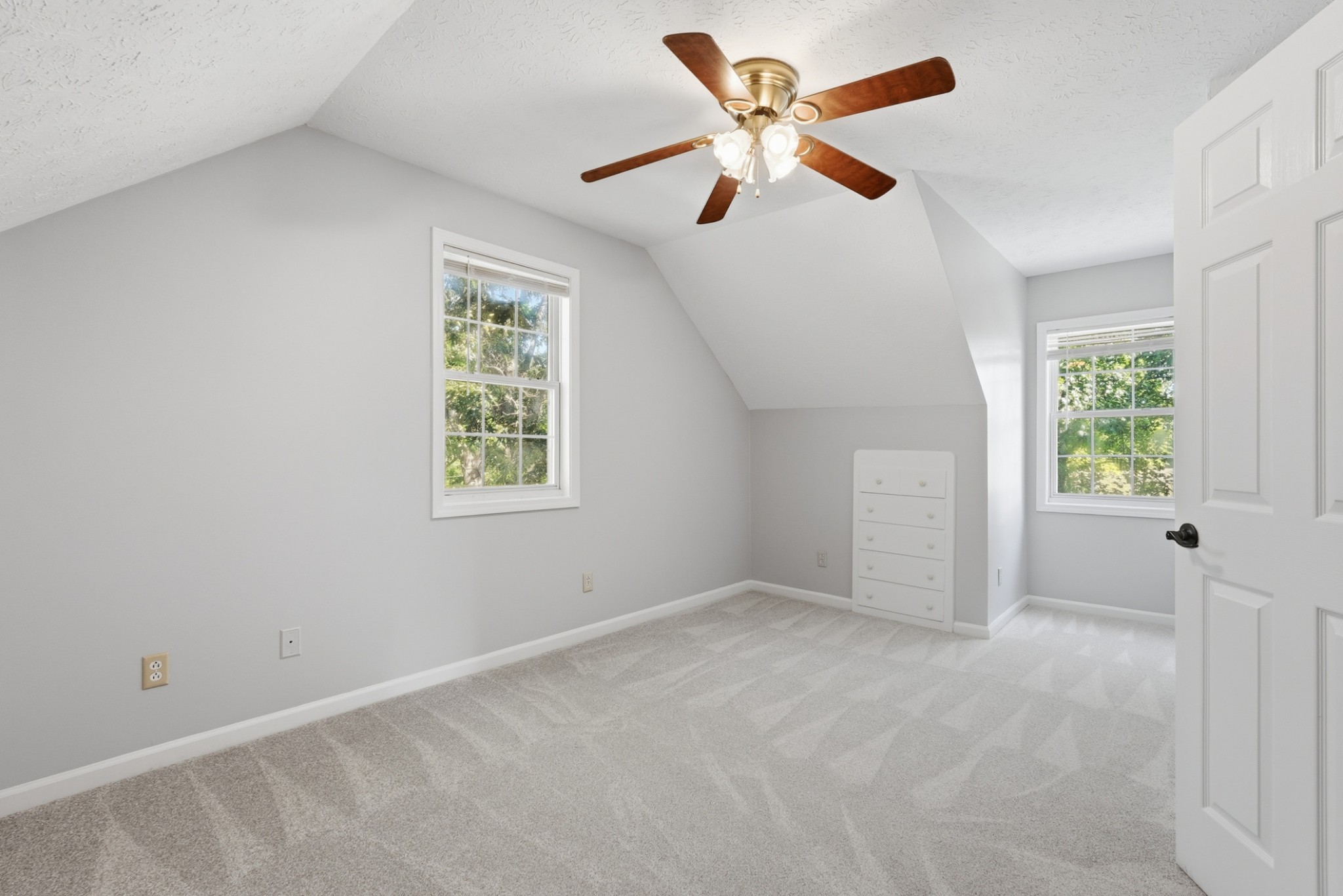 4877 Swafford Road Cookeville, TN 38501 - Photo 11 of 28 an empty room with a window and a fan
