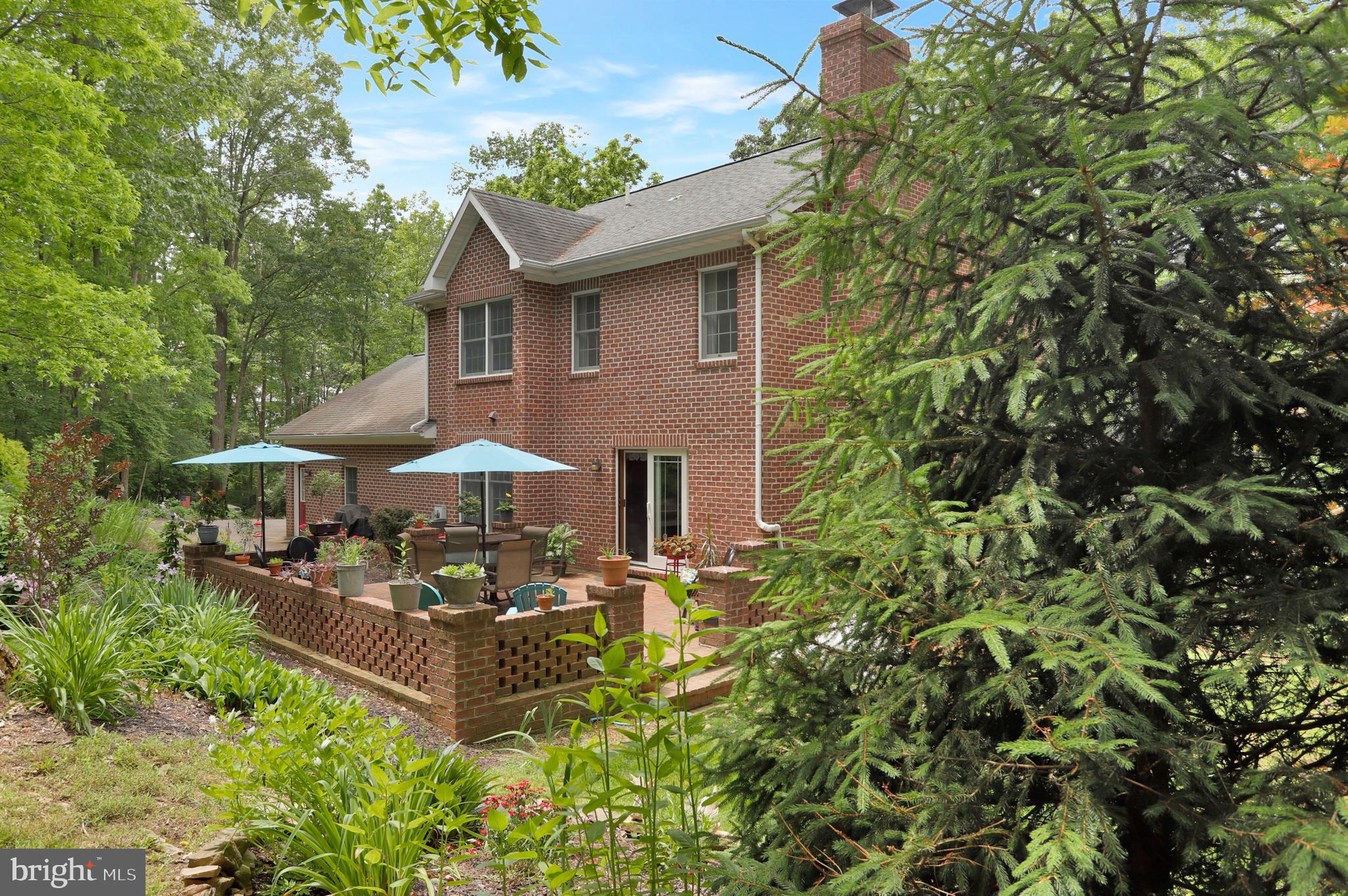 20038 Toms Road Boonsboro, MD 21713 - Photo 4 of 38 Back of the house with brick patio