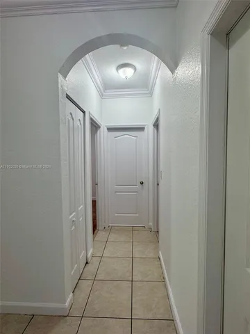a utility room with a sink washer and dryer