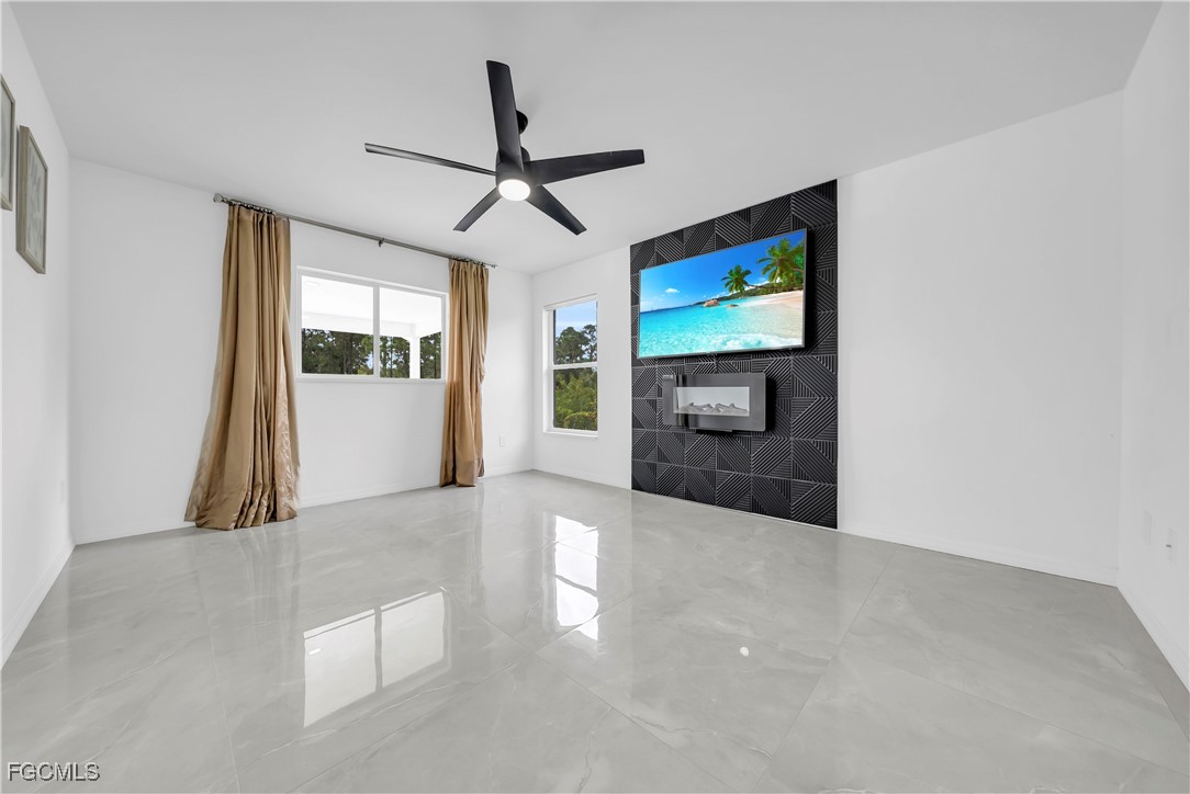 7881 Buckingham Road Fort Myers, FL 33905 - Photo 20 of 49 a view of an empty room with a window