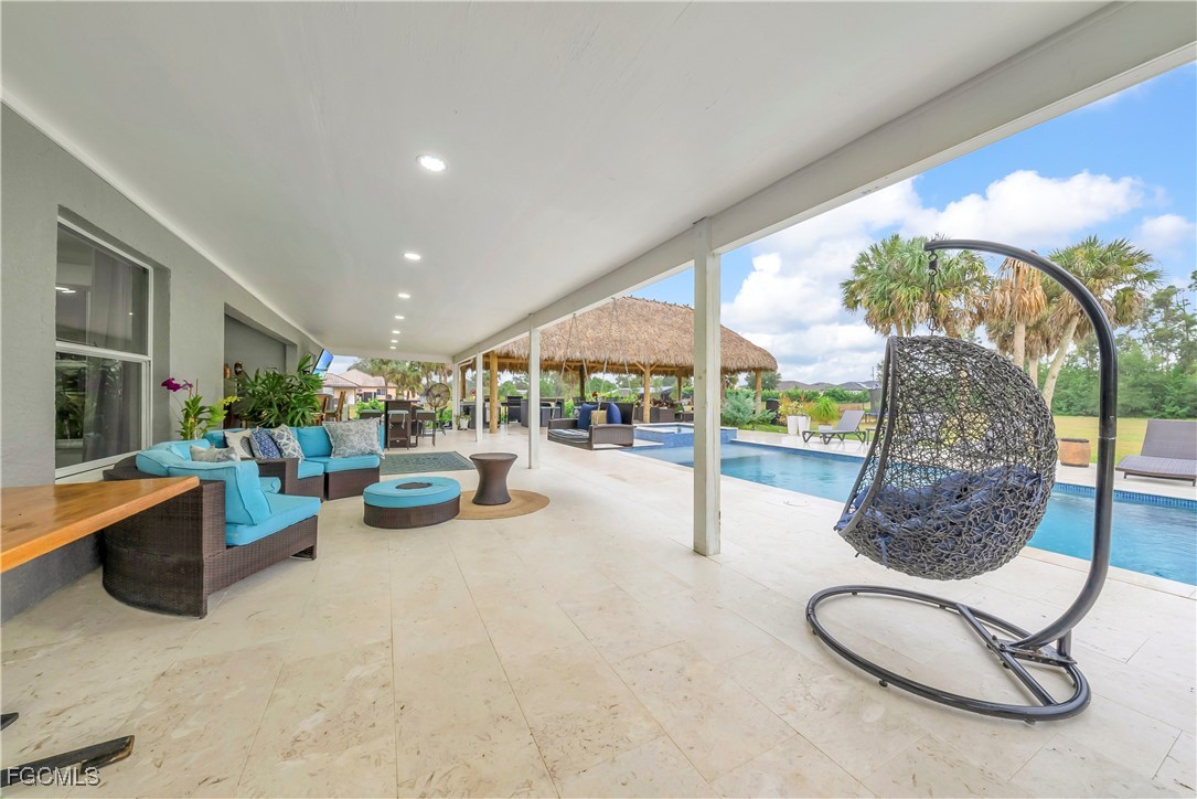7881 Buckingham Road Fort Myers, FL 33905 - Photo 28 of 49 a very nice looking room with a large window and furniture