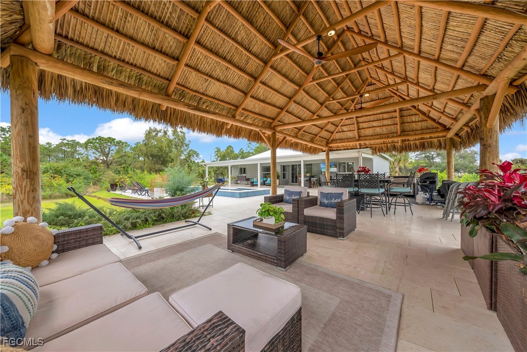 7881 Buckingham Road Fort Myers, FL 33905 - Photo 4 of 49 a living room with furniture and a garden