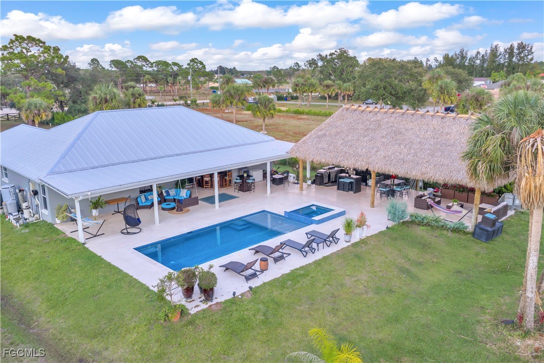 7881 Buckingham Road Fort Myers, FL 33905 - Photo 49 of 49 an aerial view of a house with swimming pool garden and outdoor seating