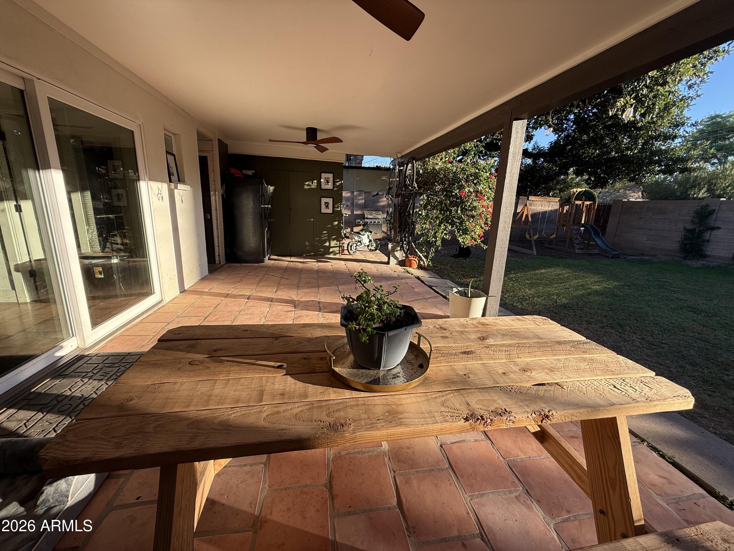 225 West Alice Avenue Phoenix, AZ 85021 - Photo 11 of 29 a view of a porch with furniture and yard