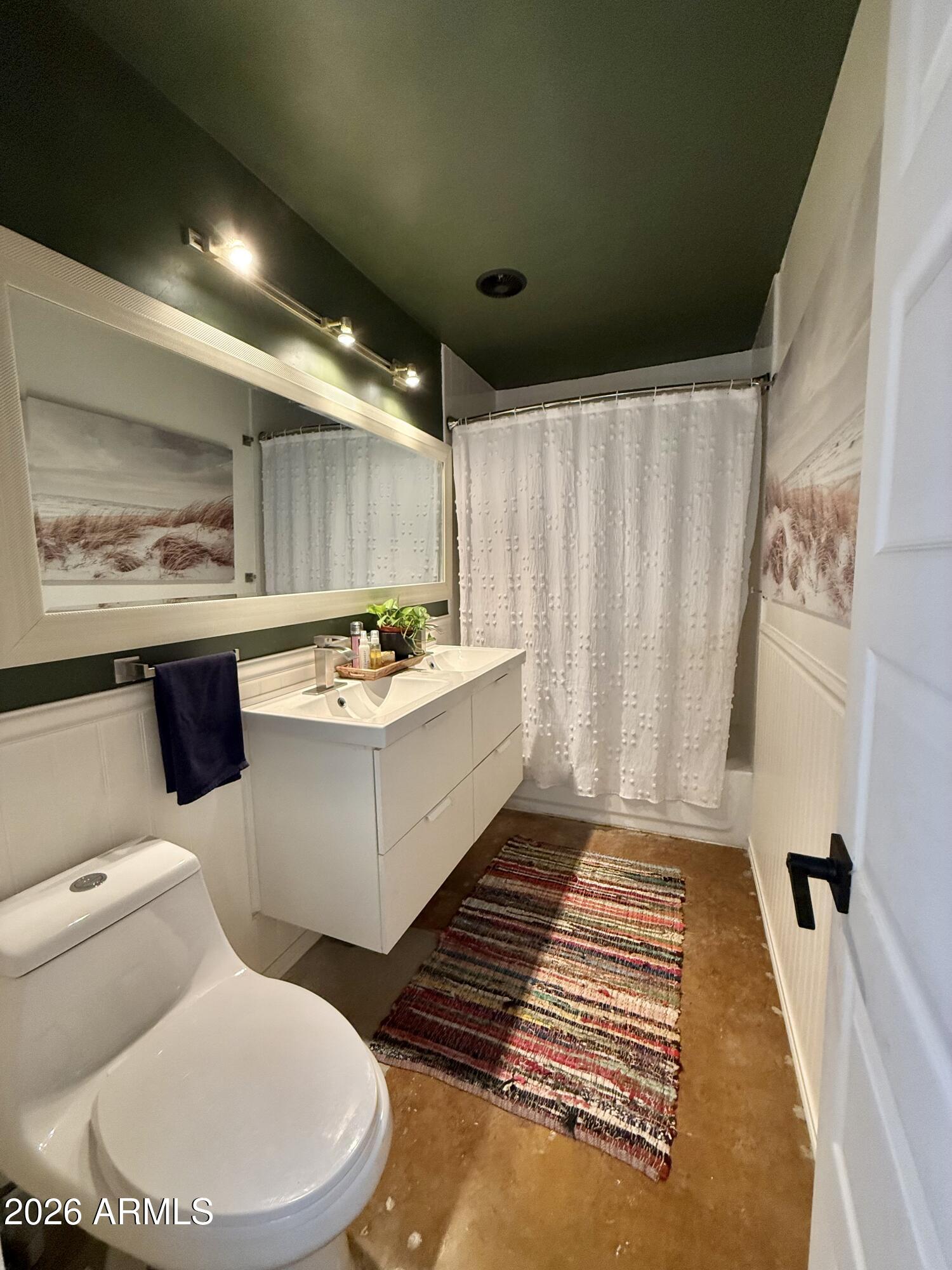 225 West Alice Avenue Phoenix, AZ 85021 - Photo 18 of 29 a bathroom with a sink toilet and shower