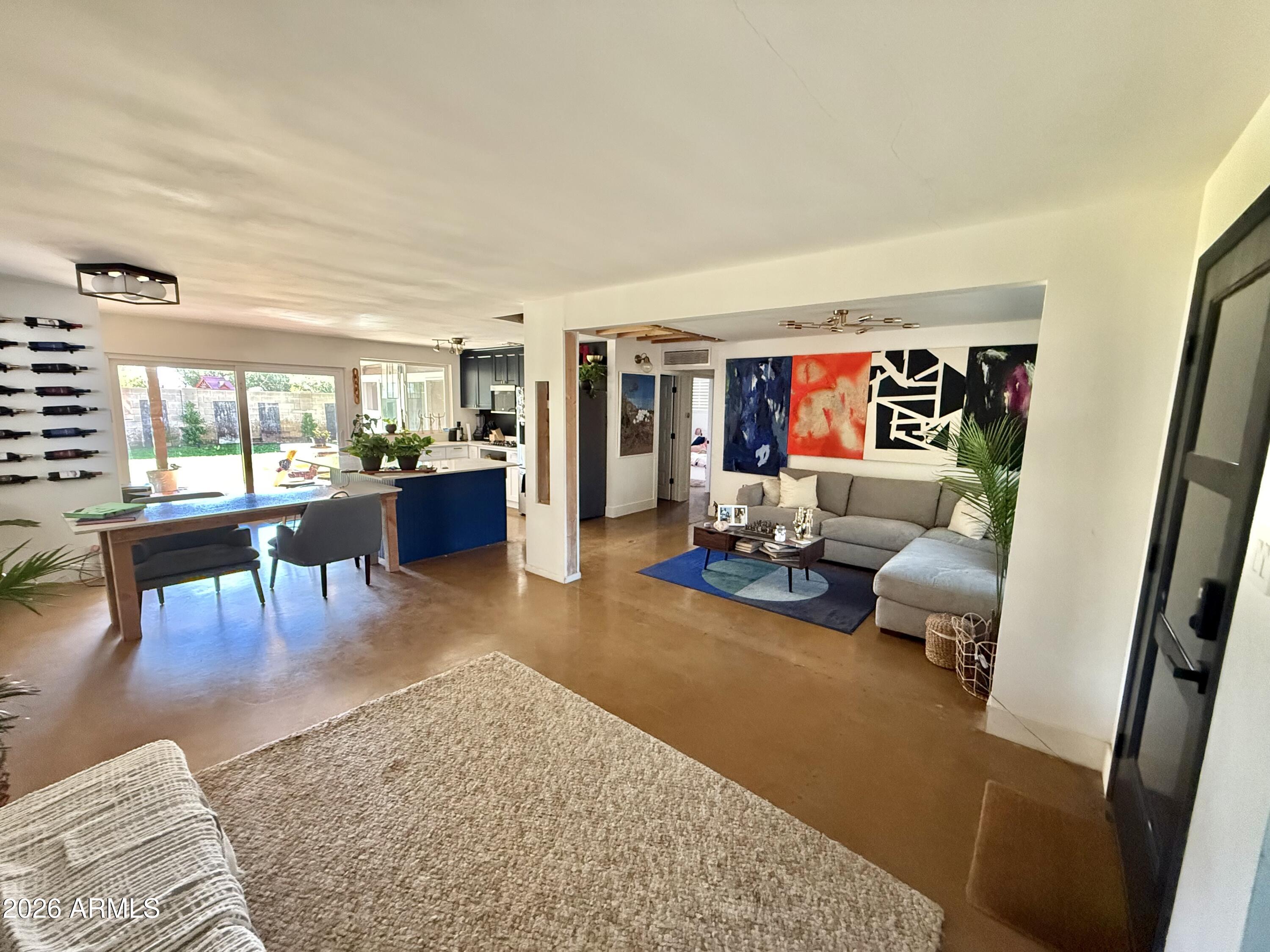 225 West Alice Avenue Phoenix, AZ 85021 - Photo 24 of 29 a living room with furniture and a rug