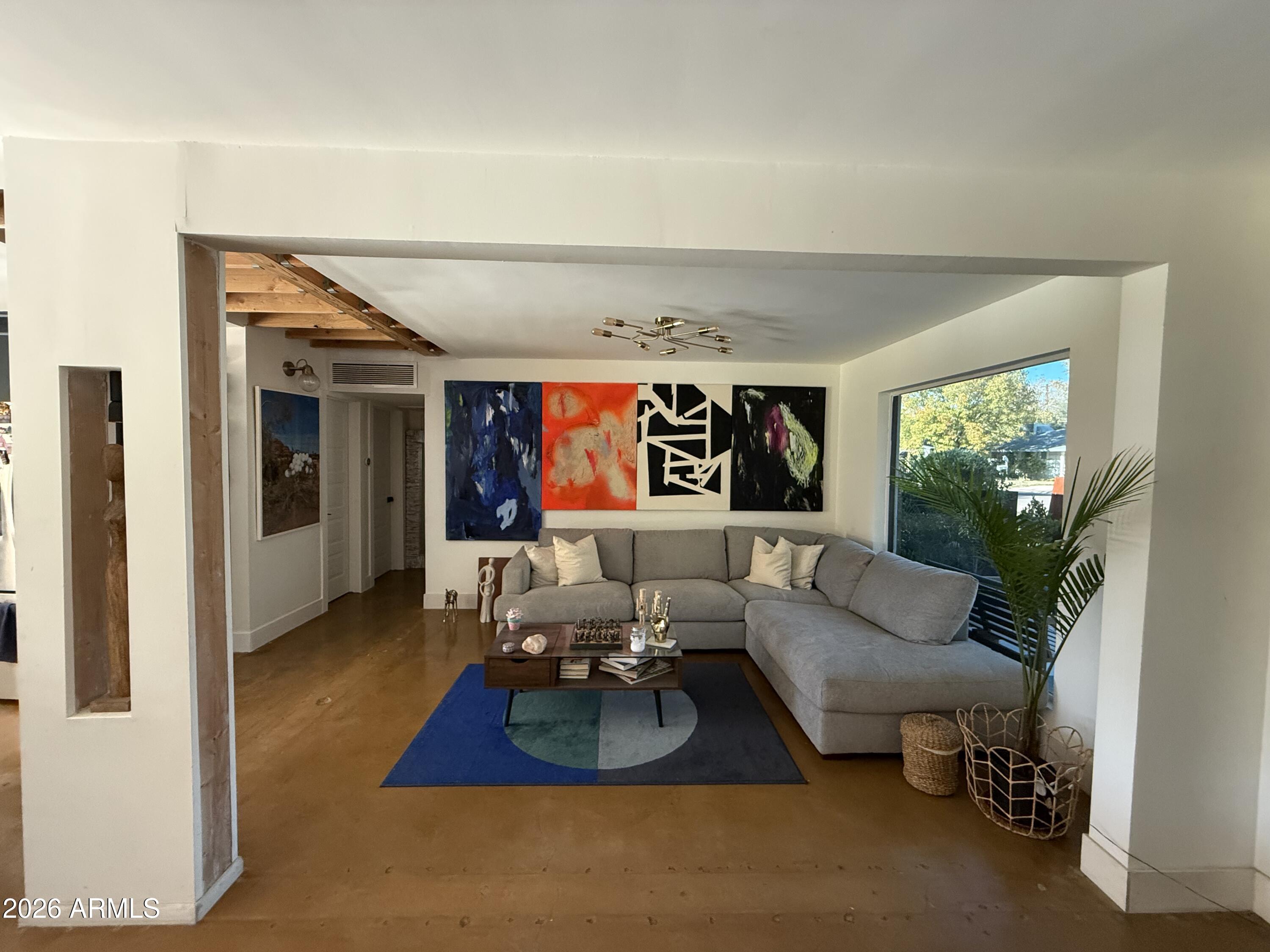 225 West Alice Avenue Phoenix, AZ 85021 - Photo 25 of 29 a living room with furniture and a large window