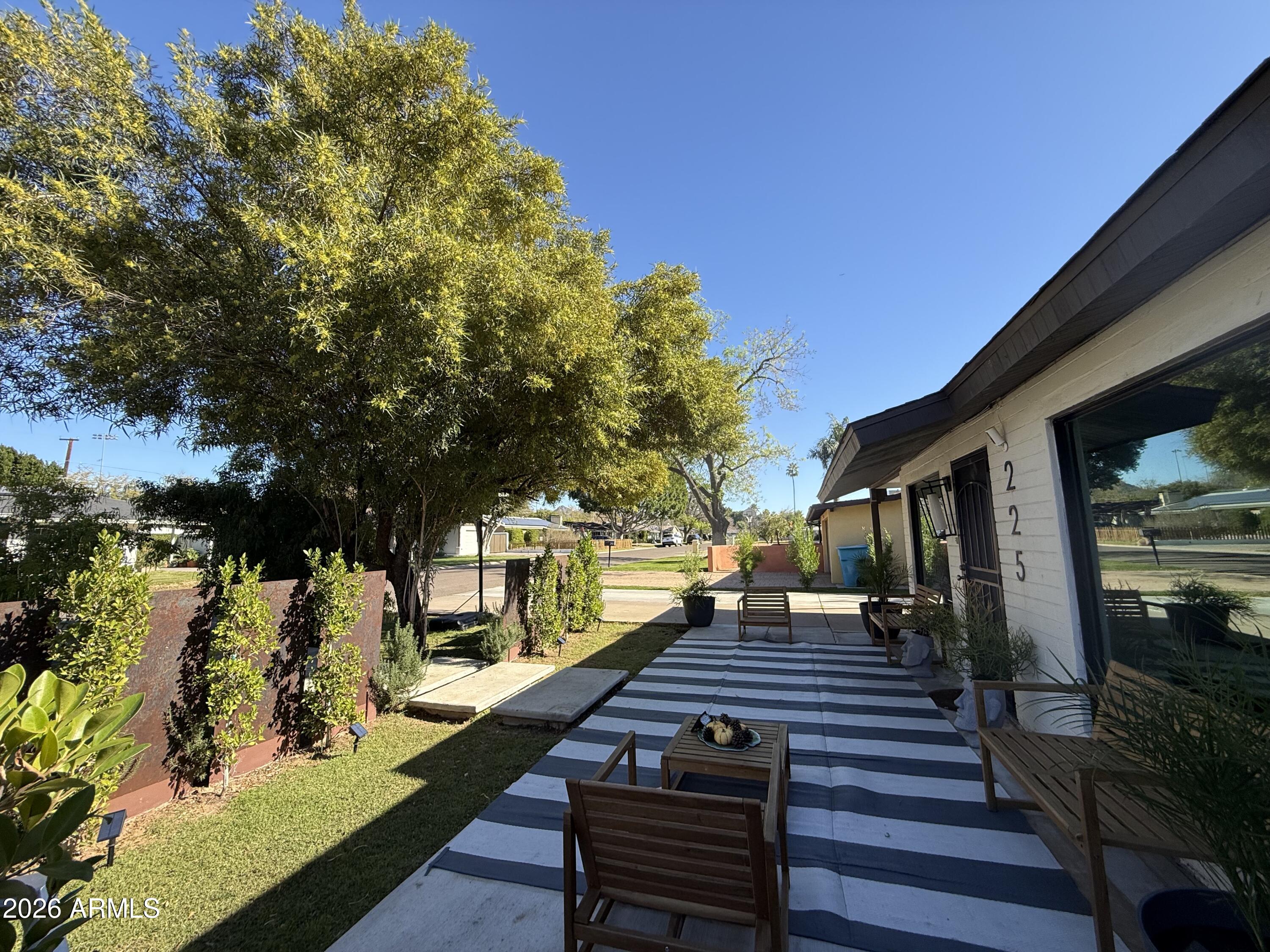 225 West Alice Avenue Phoenix, AZ 85021 - Photo 4 of 29 a view of a house with wooden deck