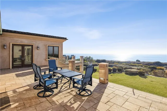 a view of a terrace with sitting area